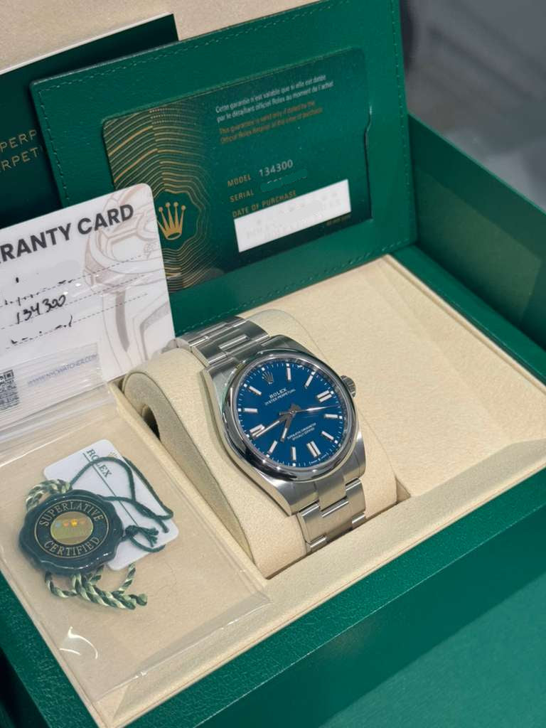 Rolex Oyster Perpetual - Stainless Steel - 41 MM - Oyster Bracelet - Med Blue Dial - Domed Bezel - 134300-0009