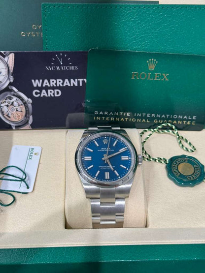 Rolex Oyster Perpetual - Stainless Steel - 41 MM - Oyster Bracelet - Med Blue Dial - Domed Bezel - 134300-0009
