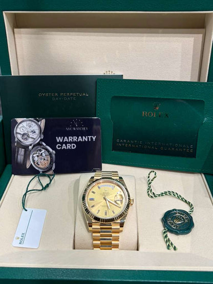 Rolex Presidential Yellow Gold Day-Date 40MM - President Bracelet Watch - Champagne Baguette Diamond Dial - 228238-0005