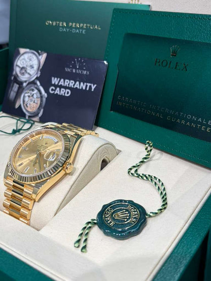Rolex Presidential Yellow Gold Day-Date 40MM - President Bracelet Watch - Champagne Baguette Diamond Dial - 228238-0005