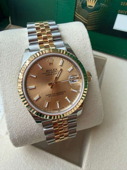 Rolex Steel and Yellow Gold Datejust - 31 MM - Jubilee Bracelet - Fluted Bezel - Champagne Index Dial - 278273-0014