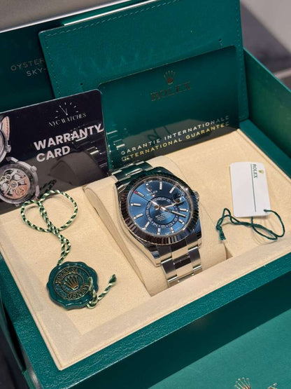 Rolex Stainless Steel and White Gold Sky Dweller Watch - 42 MM - Oyster Bracelet - Fluted Ring Command Bezel - Blue Index Dial - 336934-0005
