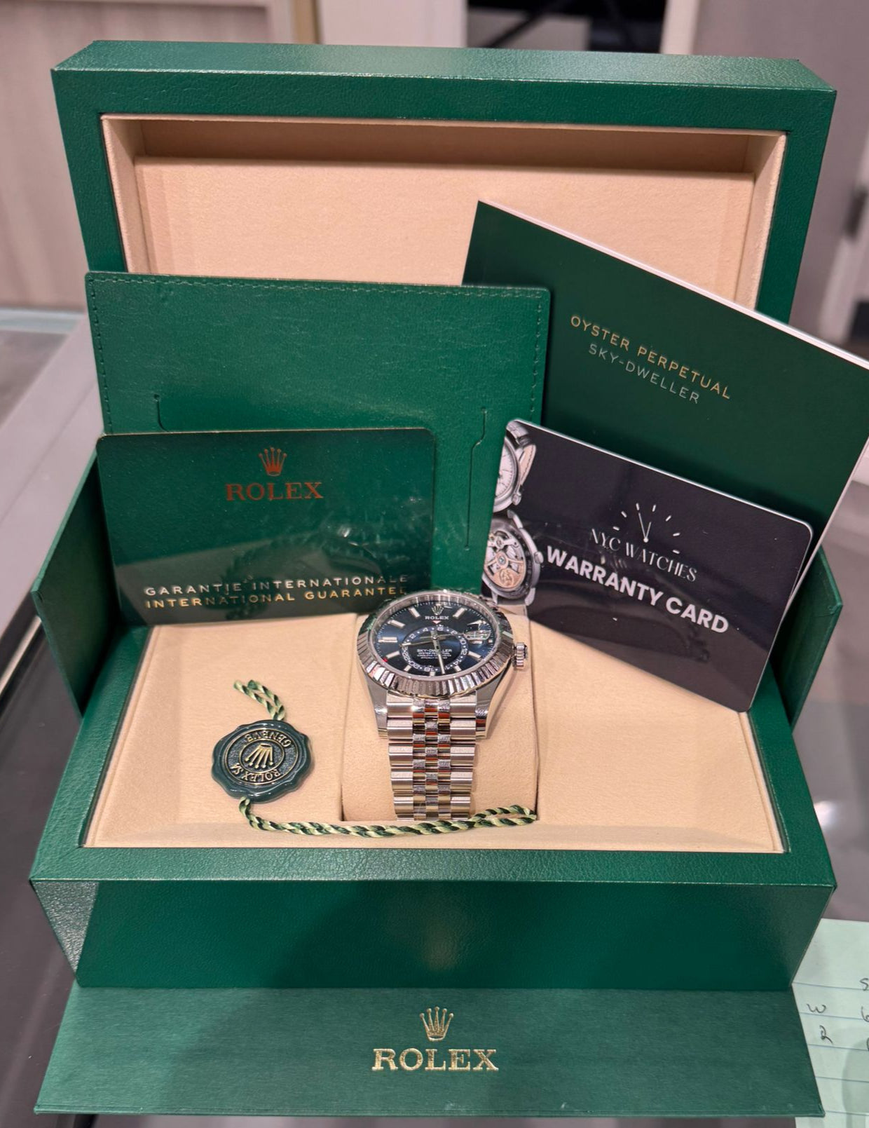 Rolex Stainless Steel and White Gold Sky Dweller Watch - 42 MM - Jubilee Bracelet - Fluted Ring Command Bezel - Blue Index Dial - 336934 blij