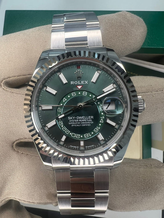 Rolex Stainless Steel and White Gold Sky Dweller Watch - 42 MM - Oyster Bracelet - Fluted Ring Command Bezel - Green Index Dial - 336934 grio