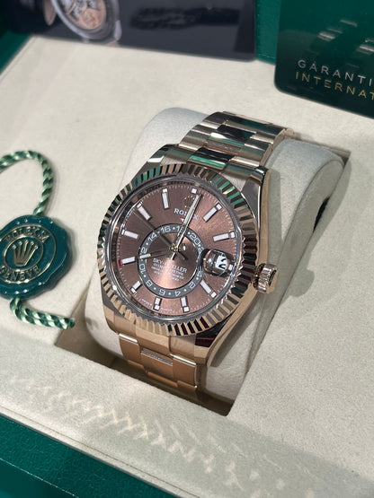 Rolex Everose Gold Sky Dweller Watch - 42 MM - Oyster Bracelet - Fluted Ring Command Bezel - Chocolate Index Dial - 336935-0002
