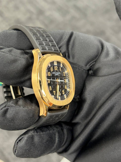 Patek Philippe Aquanaut - 36 MM - Yellow Gold - 5066J