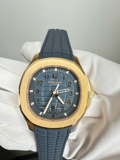 Patek Philippe Aquanaut - Travel Time - 38.8 MM - Yellow Gold - 5269R