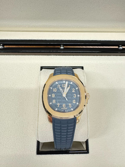 Patek Philippe Aquanaut - Travel Time - 38.8 MM - Yellow Gold - 5269R