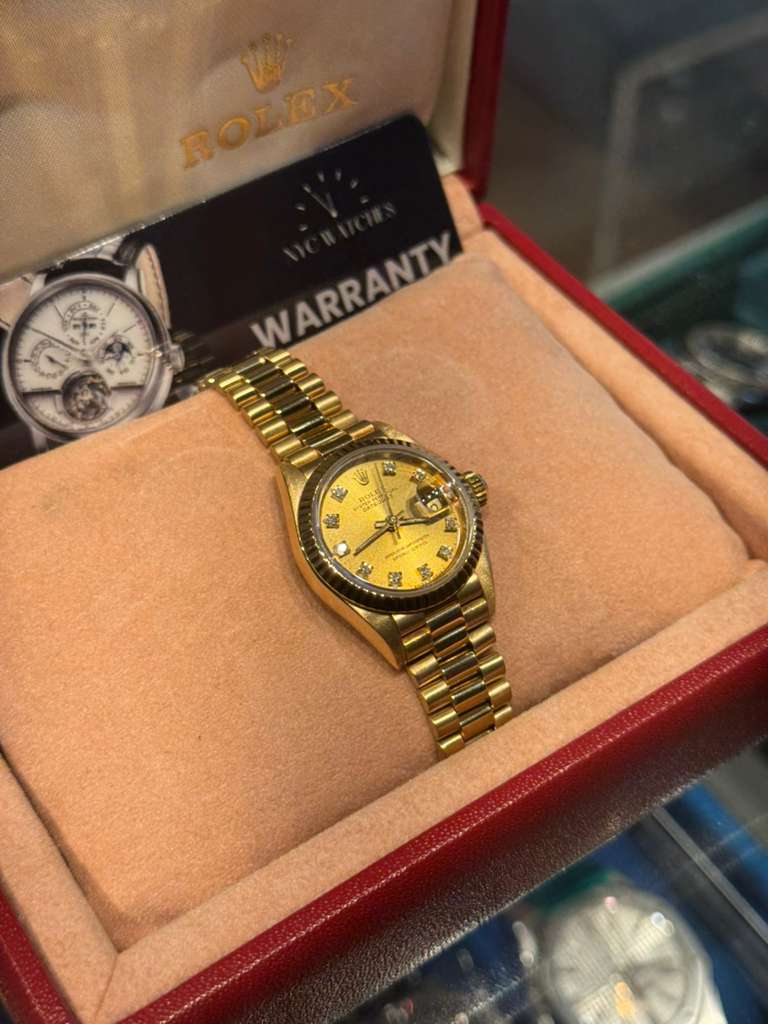 Rolex Datejust - 26 MM - Yellow Gold - President Bracelet - Fluted Bezel - Champagne Diamond Dial - 68178 chdp