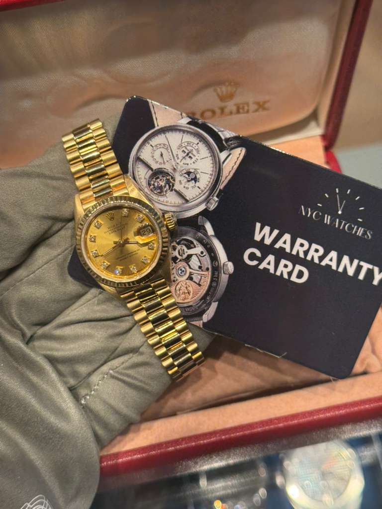 Rolex Datejust - 26 MM - Yellow Gold - President Bracelet - Fluted Bezel - Champagne Diamond Dial - 68178 chdp