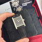 Cartier - Tank Must - Large Model - 33.7 MM x 25.5 MM - Stainless Steel - Black Lacquered Dial - Black Alligator Leather Strap - WSTA0108