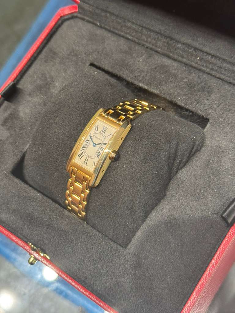 Cartier - Tank Americaine - Ladies Watch - 19.0 MM x 35.0 MM - Yellow Gold - White Dial - W26015K2