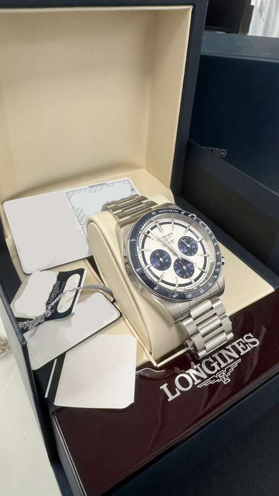 Longines Conquest Chronograph - 42 MM - Steel Case - Ceramic Bezel - Silver with Blue Counters Dial - L3.835.4.98.6