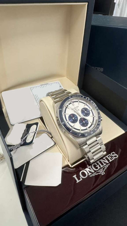 Longines Conquest Chronograph - 42 MM - Steel Case - Ceramic Bezel - Silver with Blue Counters Dial - L3.835.4.98.6