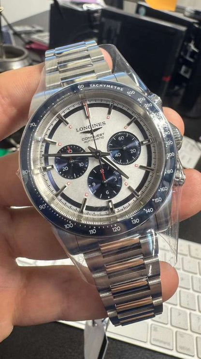 Longines Conquest Chronograph - 42 MM - Steel Case - Ceramic Bezel - Silver with Blue Counters Dial - L3.835.4.98.6