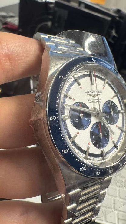 Longines Conquest Chronograph - 42 MM - Steel Case - Ceramic Bezel - Silver with Blue Counters Dial - L3.835.4.98.6