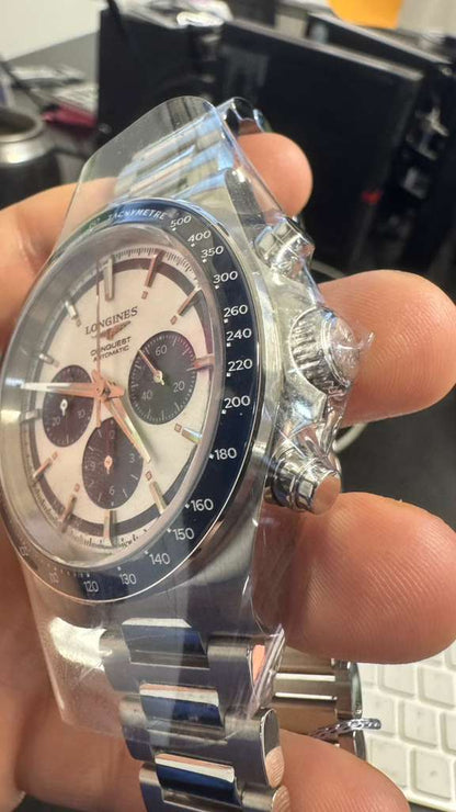 Longines Conquest Chronograph - 42 MM - Steel Case - Ceramic Bezel - Silver with Blue Counters Dial - L3.835.4.98.6