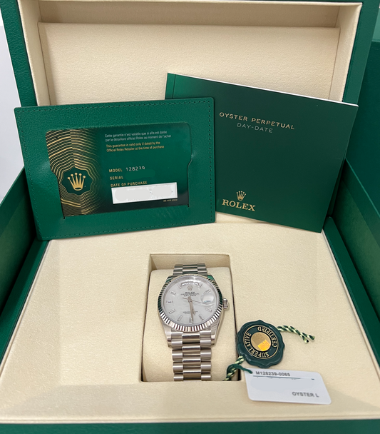 Rolex Day-Date - 36 MM - White Gold - MoP White Dial - 128239-0065
