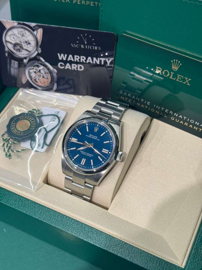 Rolex Oyster Perpetual - Stainless Steel - 41 MM - Oyster Bracelet - Med Blue Dial - Domed Bezel - 134300-0009