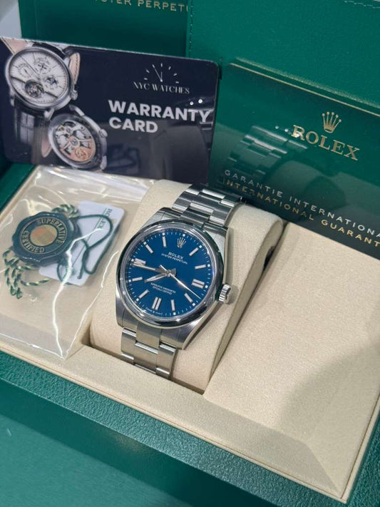 Rolex Oyster Perpetual - Stainless Steel - 41 MM - Oyster Bracelet - Med Blue Dial - Domed Bezel - 134300-0009