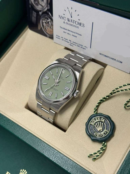 Rolex Oyster Perpetual - Stainless Steel - 41 MM - Oyster Bracelet - Pistachio Dial - Domed Bezel - 134300-0006