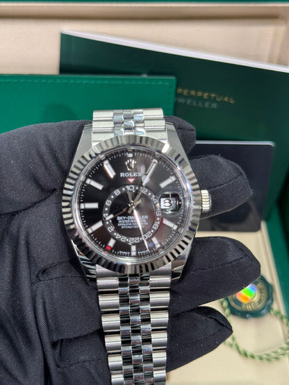 Rolex Stainless Steel and White Gold Sky Dweller Watch - 42 MM - Jubilee Bracelet - Fluted Ring Command Bezel - Black Index Dial - 336934-0008