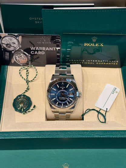 Rolex Stainless Steel and White Gold Sky Dweller Watch - 42 MM - Oyster Bracelet - Fluted Ring Command Bezel - Blue Index Dial - 336934-0005