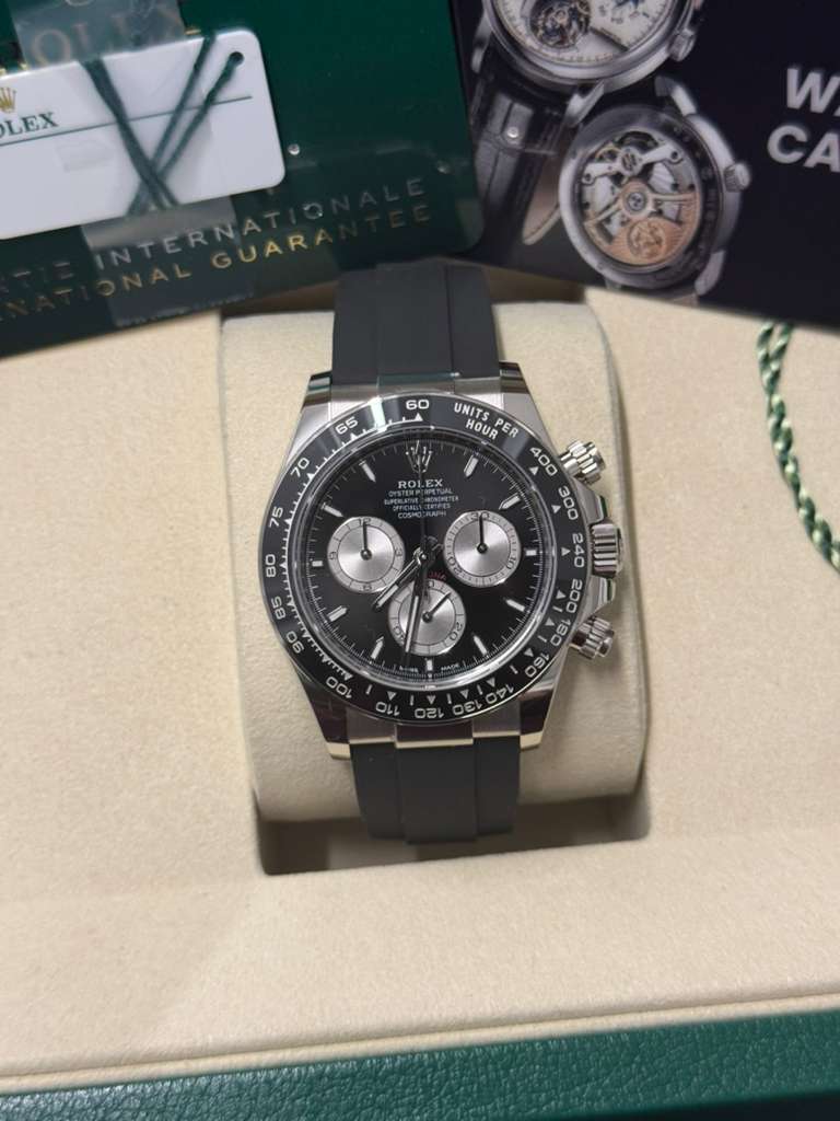 Rolex White Gold Cosmograph Daytona Watch - 40 MM - Oysterflex Strap - Black Ceramic Bezel - Black And Steel Index Dial - 126519LN-0002