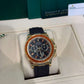 Rolex Yellow Gold Daytona Watch - 40 MM - Oysterflex Strap - Black Diamond Dial - Orange Baguette Sapphire Bezel - 116588SACO