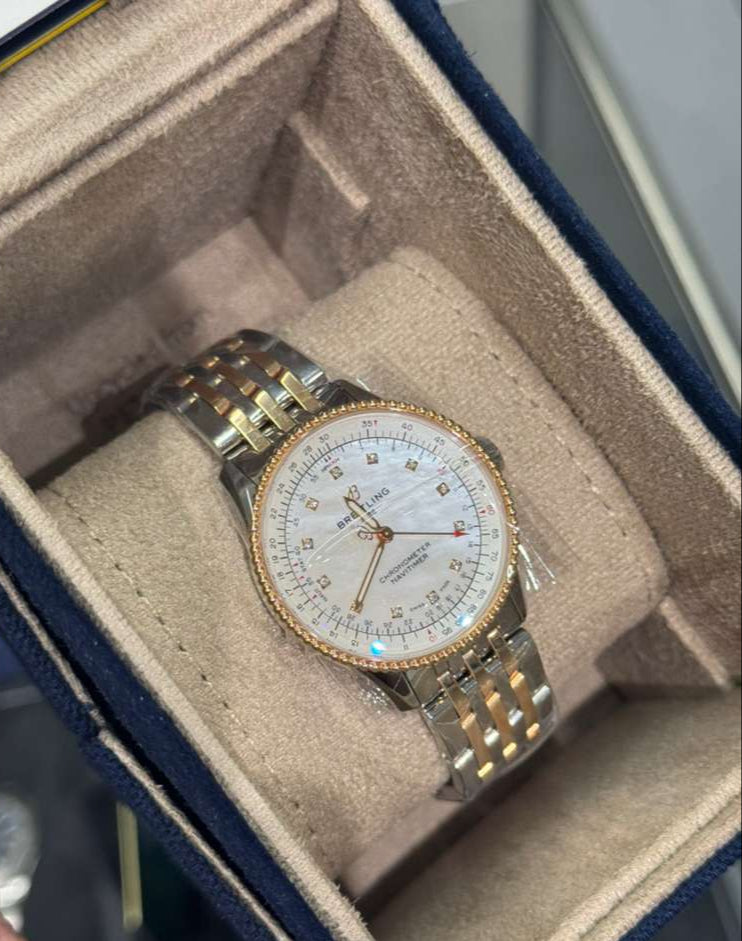 Breitling Navitimer Stainless Steel and Rose Gold 35 MM - Metal Bracelet - Mother-Of-Pearl Dial - U17395211A1U1