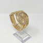 Rolex Yellow Gold Day-Date 40 MM - President Bracelet - Diamond Bezel - Champagne Baguette Diamond Dial - 228348RBR-0002