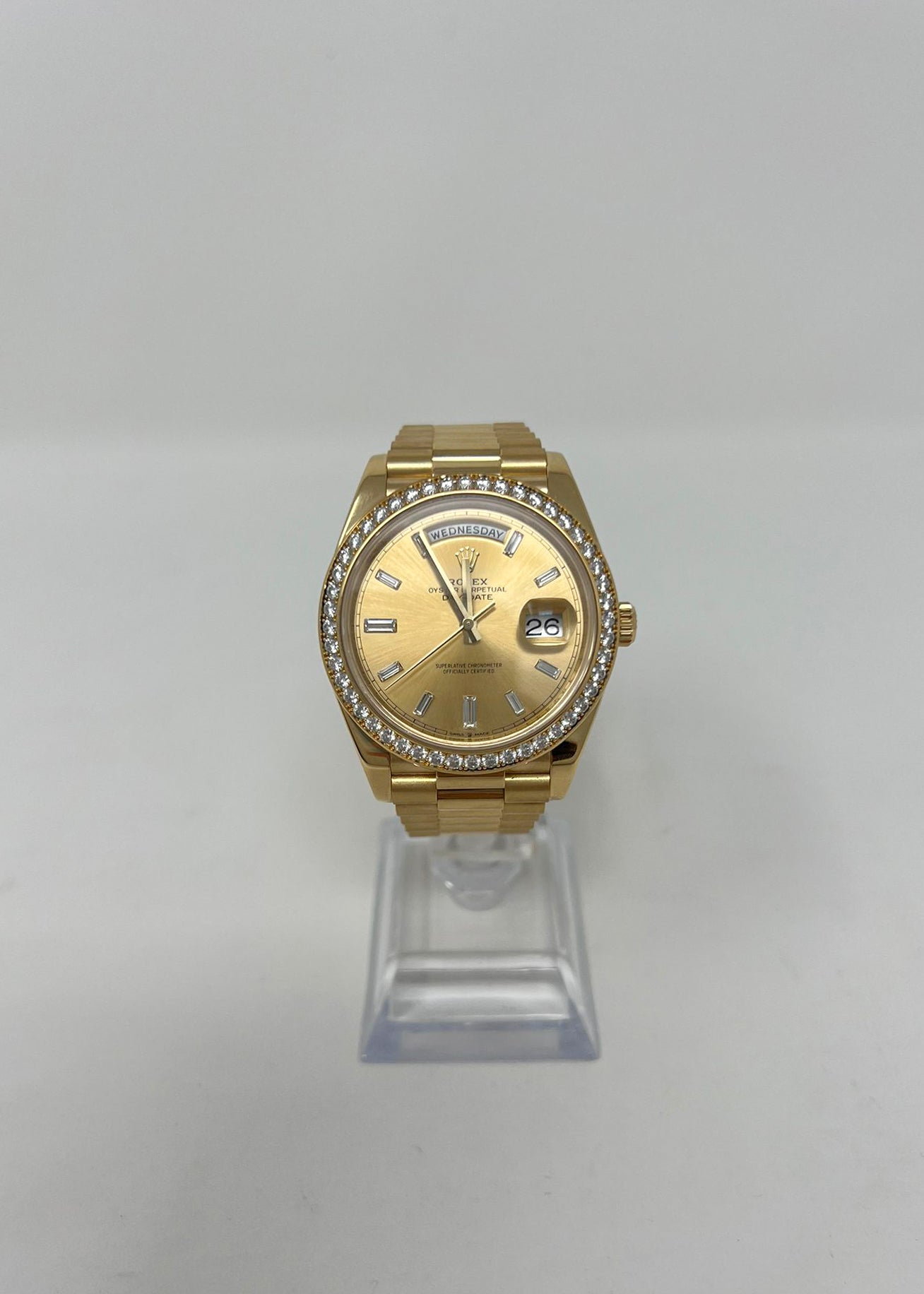 Rolex Yellow Gold Day-Date 40 MM - President Bracelet - Diamond Bezel - Champagne Baguette Diamond Dial - 228348RBR-0002