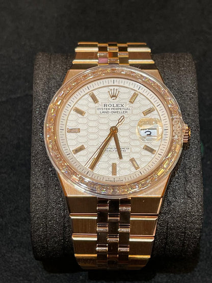 Rolex Land-Dweller - 40 MM - Rose Gold - Honeycomb Motif Intense White Dial - Diamond Bezel - Jubilee Bracelet - 127385TBR-0003
