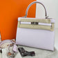 Hermès Kelly Sellier 25 - Mauve Pale - Epsom - Palladium Hardware - K25MEPHW