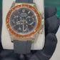 Rolex Yellow Gold Daytona Watch - 40 MM - Oysterflex Strap - Black Diamond Dial - Orange Baguette Sapphire Bezel - 116588SACO