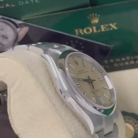 Rolex Oyster Perpetual - Stainless Steel - 41 MM - Oyster Bracelet - Beige Dial - Domed Bezel - 134300-0007
