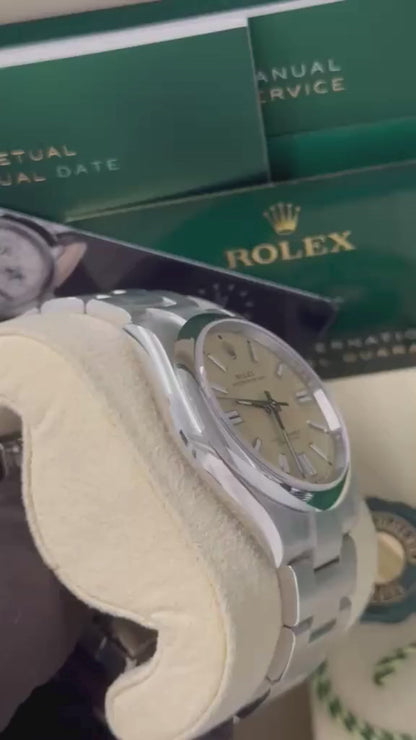 Rolex Oyster Perpetual - Stainless Steel - 41 MM - Oyster Bracelet - Beige Dial - Domed Bezel - 134300-0007