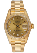 Rolex Datejust - 26 MM - Yellow Gold - President Bracelet - Fluted Bezel - Champagne Diamond Dial - 68178 chdp